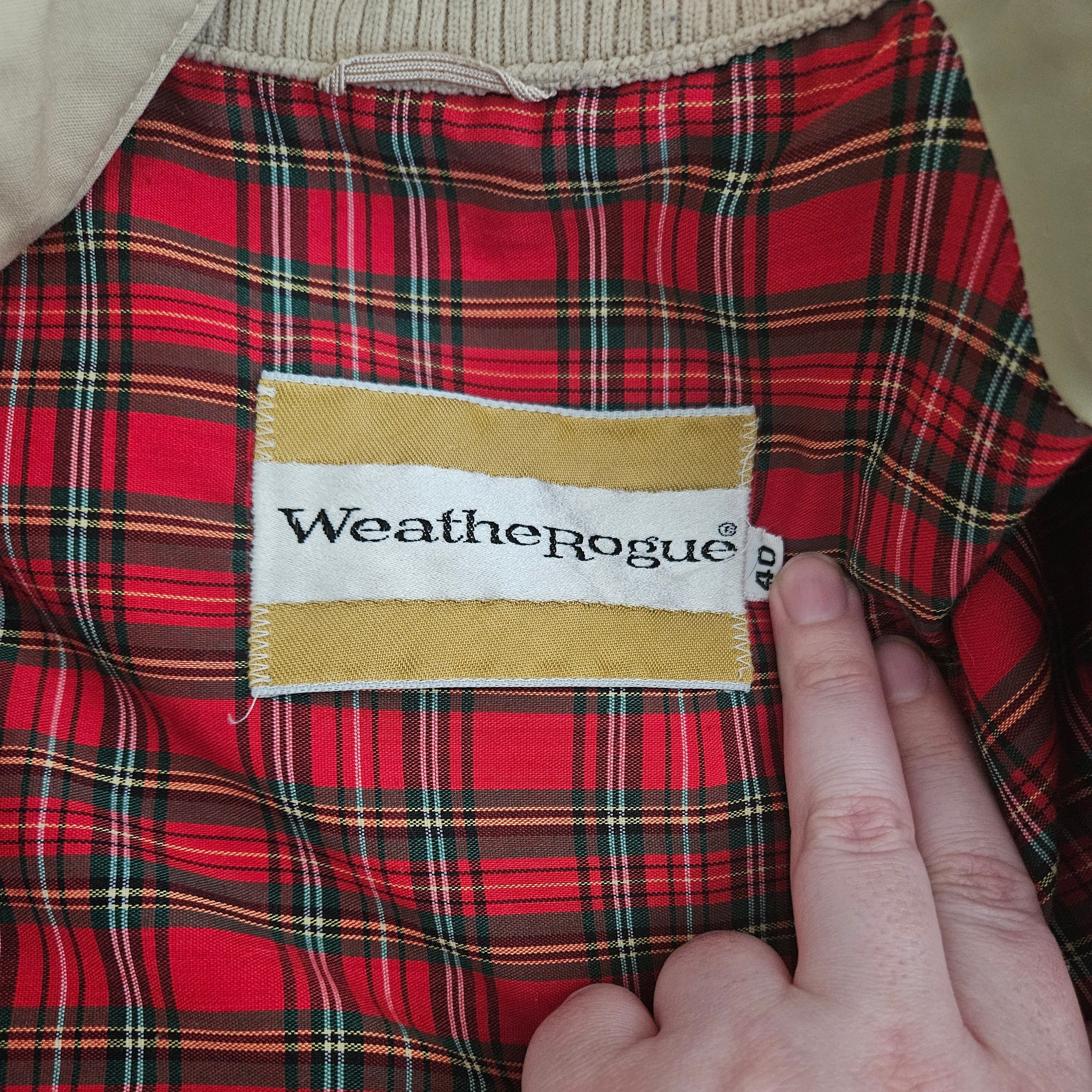Brand tag on a red plaid lining