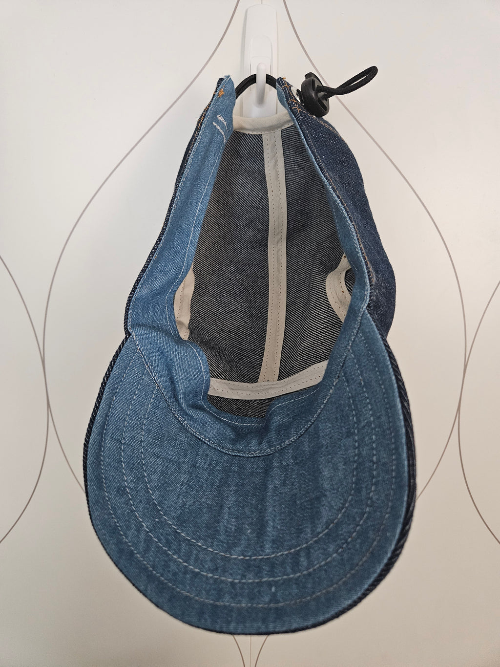 Inside view of denim camp hat