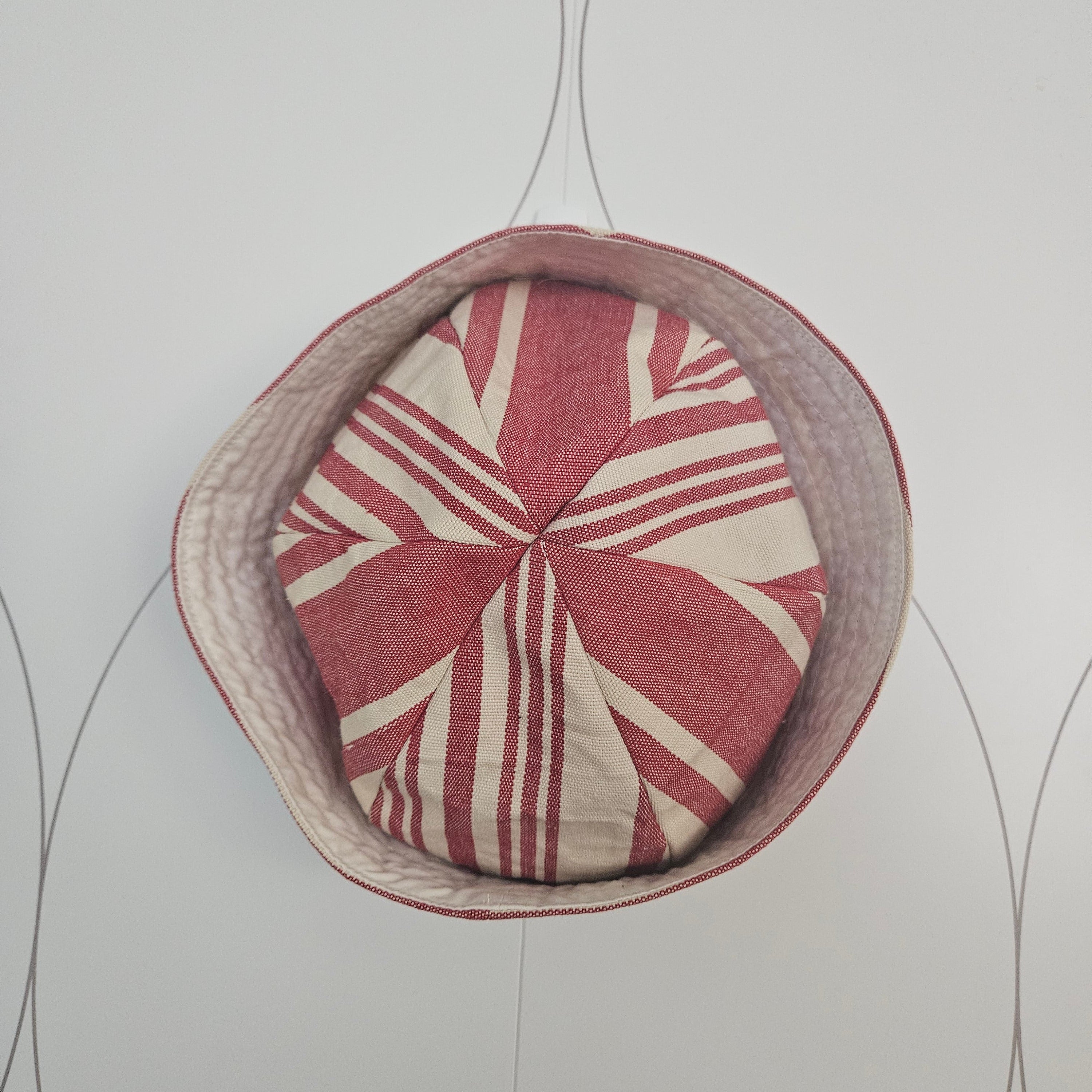 Top of red and white striped sailor hat