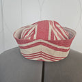 Front of red and white striped sailor hat on dress form