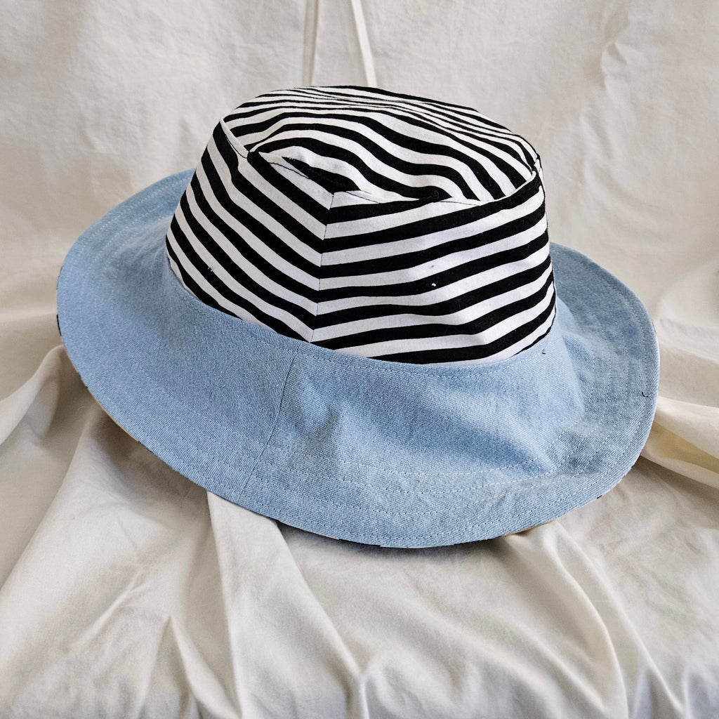 Side view of a blue and striped bucket hat