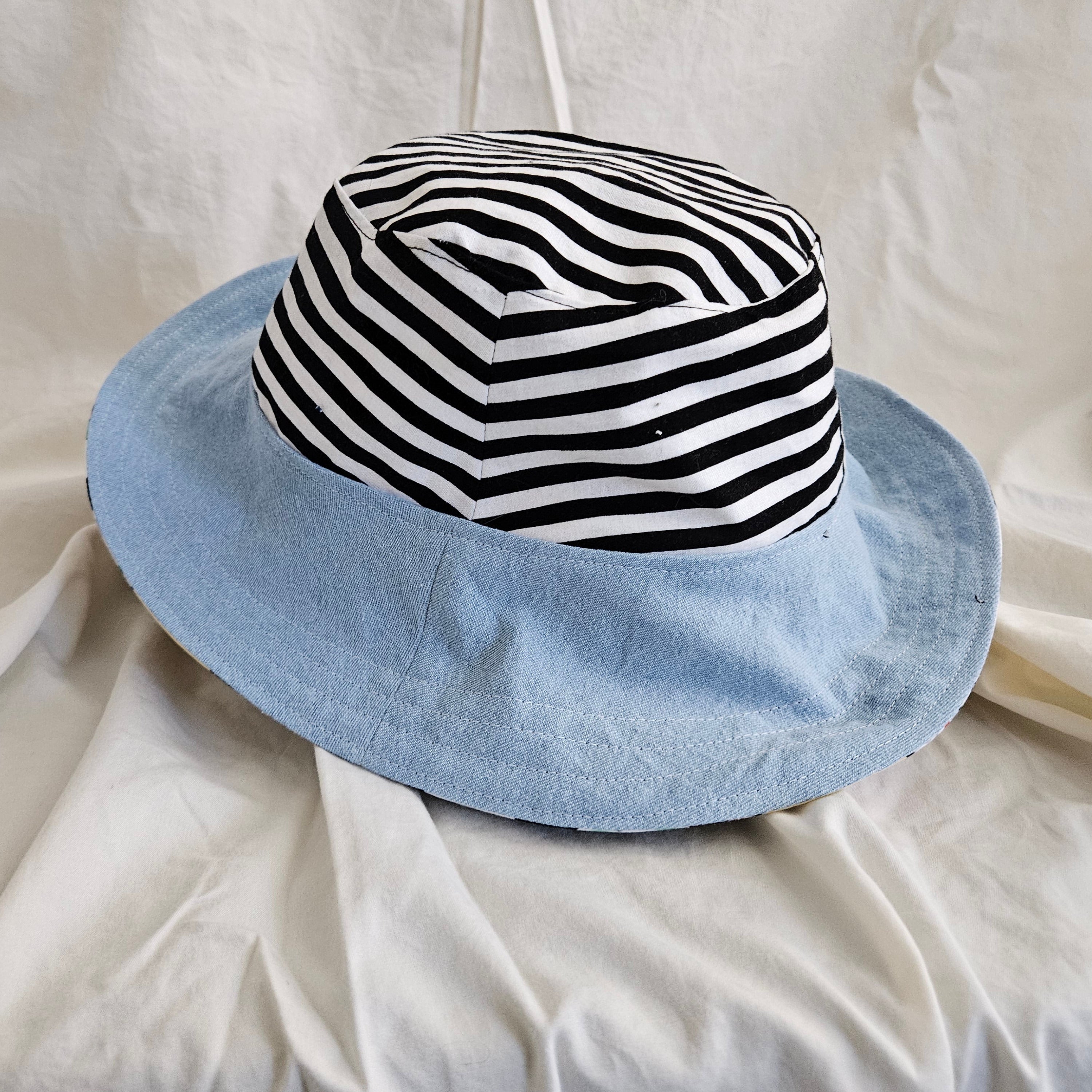 Side view of a blue and striped bucket hat