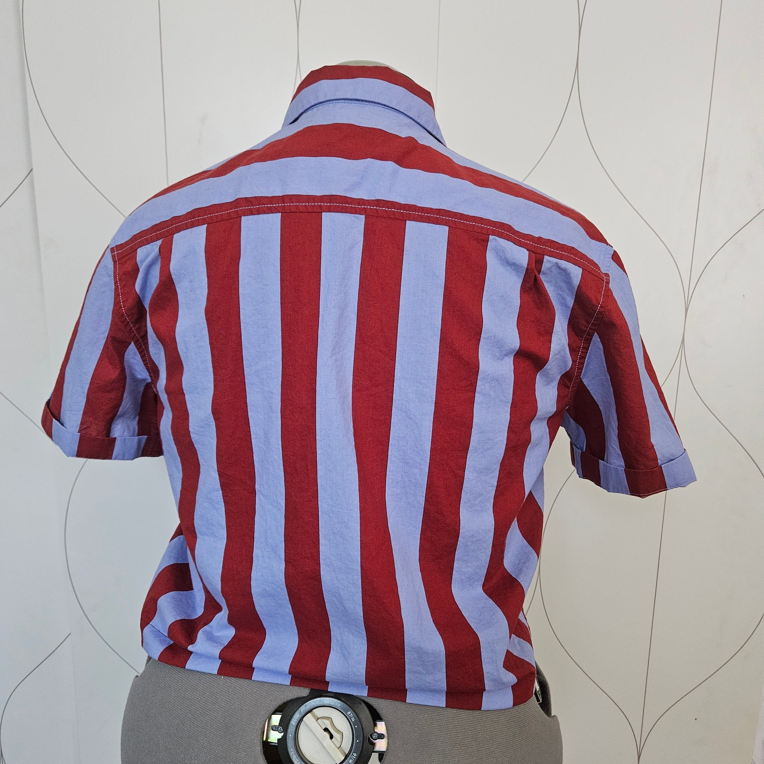 Back of red and purple striped button-up